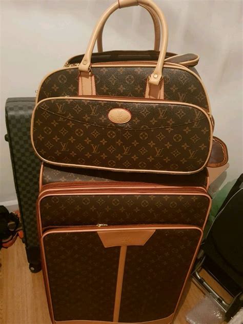 louis vuitton luggage set mens